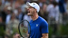 Britain's Andy Murray celebrates after winning against Australia's Alexei Popyrin during their men's singles round of 32 match at the Cinch ATP tennis Championships at Queen's Club in west London on June 18, 2024. (Photo by Ben Stansall / AFP)
