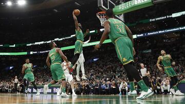 Dec 6, 2019; Boston, MA, USA; Surrounded by his teammates, Boston Celtics guard Jaylen Brown (7) goes in for a dunk against the Denver Nuggets during the second half at TD Garden. Mandatory Credit: Winslow Townson-USA TODAY Sports