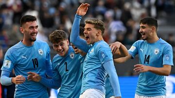 Israel's forward Omer Senior (C) celebrates with teammates after scoring a goal during the Argentina 2023 U-20 World Cup third-place match between Israel and South Korea at the Estadio Unico Diego Armando Maradona stadium in La Plata, Argentina, on June 11, 2023. (Photo by Luis ROBAYO / AFP)