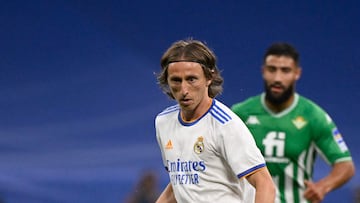 (FILES) In this file photo taken on May 20, 2022 Real Madrid's Croatian midfielder Luka Modric kicks the ball during the Spanish league football match between Real Madrid CF and Real Betis at the Santiago Bernabeu stadium in Madrid . - Real Madrid midfielder Luka Modric has renewed for another season, the Madrid club announced on June 8, 2022. (Photo by PIERRE-PHILIPPE MARCOU / AFP)