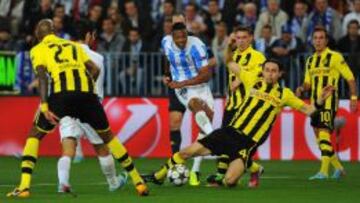 Baptista dispara ante la oposición de Subotic.