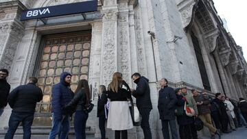 People make a long queues in front of the BBVA bank since early hours before the banks open on September 3, 2019 in Buenos Aires, Argentina. After that government imposed capital controls, the people make long lines to withdraw their money from banks. (Photo by Carol Smiljan/NurPhoto via Getty Images)