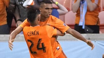 Houston Dynamo's Mauro Manotas (9) celebrates with Darwin Ceren (24) after scoring a goal against the Montreal Impact during the second half of an MLS soccer match Saturday, March 9, 2019, in Houston. (AP Photo/David J. Phillip)