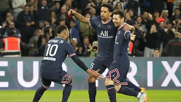 PSG&#039;s Neymar, left, and Marquinhos, center, celebrate as Lionel Messi, right, scored the opening goal during the French League One soccer match between Paris Saint Germain and Lens at Parc des Princes stadium in Paris, Saturday, April 23, 2022. (AP P