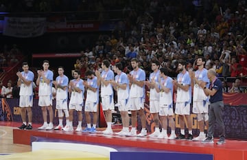 Argentina players receive their runners-up medals.