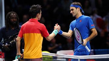 LONDON, ENGLAND - NOVEMBER 11: Kei Nishikori of Japan shakes hands with Roger Federer of Switzerland after their match during Day One of the Nitto ATP World Tour Finals at The O2 Arena on November 11, 2018 in London, England. (Photo by Clive Brunskill/Getty Images)