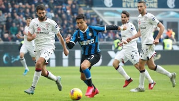 Soccer Football - Serie A - Inter Milan v Cagliari - San Siro, Milan, Italy - January 26, 2020 Inter Milan's Alexis Sanchez in action with Cagliari's Paolo Farago REUTERS/Alessandro Garofalo