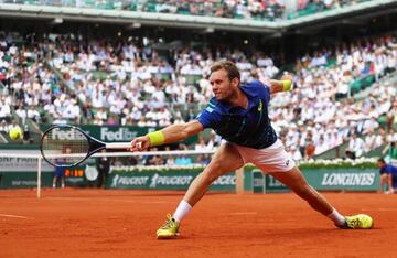 Bourgue gets away another backhand.