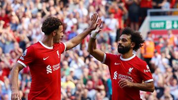 Soccer Football - England - Premier League - Liverpool v Aston Villa - Anfield, Liverpool, Britain - September 3, 2023 Liverpool's Mohamed Salah celebrates scoring their third goal with Curtis Jones REUTERS/Molly Darlington EDITORIAL USE ONLY. No use with unauthorized audio, video, data, fixture lists, club/league logos or 'live' services. Online in-match use limited to 75 images, no video emulation. No use in betting, games or single club /league/player publications. Please contact your account representative for further details.