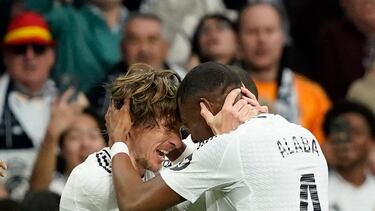 Soccer Football - LaLiga - Real Madrid v Girona - Santiago Bernabeu, Madrid, Spain - February 23, 2025 Real Madrid's Luka Modric celebrates scoring their first goal with David Alaba REUTERS/Ana Beltran