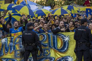 Fans of Boca Juniors gather to support their players who will play tomorrow against River Plate in the Copa CONMEBOL Libertadores second leg final outside Eurostars Suites Mirasierra hotel