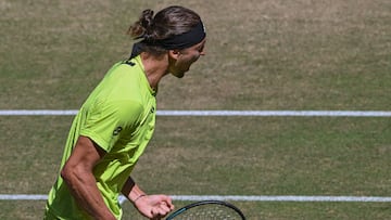 Germany's Alexander Zverev reacts during the men's singles tennis match against Italy's Flavio Cobolli at the Halle Open ATP tennis tournament in Halle (Westfalen), western Germany, on June 20, 2025. (Photo by CARMEN JASPERSEN / AFP)