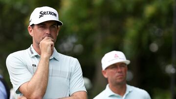 CROMWELL, CONNECTICUT - JUNE 24: (L-R) Keegan Bradley of the United States and Chez Reavie of the United States wait on the 12th tee during the third round of the Travelers Championship at TPC River Highlands on June 24, 2023 in Cromwell, Connecticut.   Patrick Smith/Getty Images/AFP (Photo by Patrick Smith / GETTY IMAGES NORTH AMERICA / Getty Images via AFP)