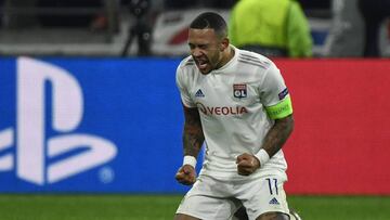 Lyon's Dutch forward Memphis Depay celebrates at the end of the UEFA Champions League group G football match between Olympique Lyonnais (OL) and RB Leipzig, on December 10, 2019 at the Parc Olympique Lyonnais stadium in Decines-Charpieu near Lyon. (P