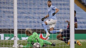 Manchester City&#039;s Riyad Mahrez scores their first goal. 