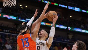 Willy Hernangomez #9 of the New Orleans Pelicans shoots against Ousmane Dieng #13 of the Oklahoma City Thunder during the second half at Smoothie King Center on November 28, 2022 in New Orleans, Louisiana.