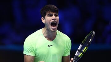 Tennis - ATP Finals - Pala Alpitour, Turin, Italy - November 13, 2023 Spain's Carlos Alcaraz celebrates after winning the first set during his group stage match against Germany's Alexander Zverev REUTERS/Guglielmo Mangiapane