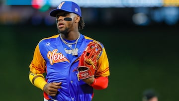 Mar 14, 2023; Miami, Florida, USA; Venezuela center fielder Ronald Acuna Jr. (42) runs toward the dugout after the fourth inning against Nicaragua at LoanDepot Park. Mandatory Credit: Sam Navarro-USA TODAY Sports