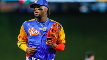 Mar 14, 2023; Miami, Florida, USA; Venezuela center fielder Ronald Acuna Jr. (42) runs toward the dugout after the fourth inning against Nicaragua at LoanDepot Park. Mandatory Credit: Sam Navarro-USA TODAY Sports