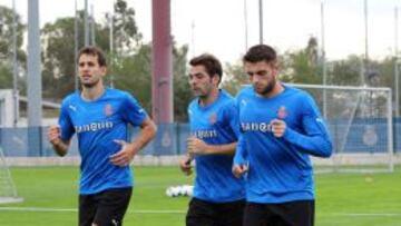 David López (dcha), en un entrenamiento.