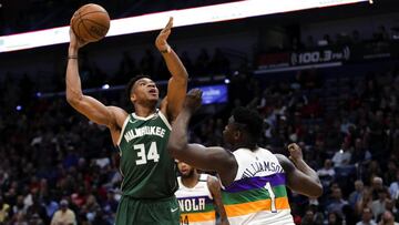 Feb 4, 2020; New Orleans, Louisiana, USA; Milwaukee Bucks forward Giannis Antetokounmpo (34) shoots over New Orleans Pelicans forward Zion Williamson (1) during the second half at the Smoothie King Center. Mandatory Credit: Derick E. Hingle-USA TODAY Sports