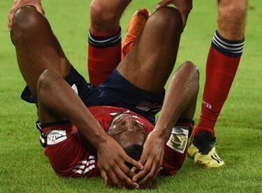 Coman out for several weeks with ankle ligament tear