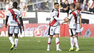 De Tomás y Embarba, celebran uno de sus goles.