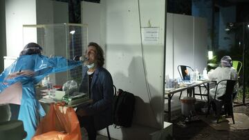 BANGKOK, THAILAND - JANUARY 01: Christian, a traveler from Belgium, receives a COVID-19 PCR test at an AQ+ hotel on January 01, 2022 in Bangkok, Thailand. Inter-country journeys made during the Omicron variant of the Coronavirus pandemic require differing measures of covid control according to the airline carrier and country of departure and arrival. Borja Sanchez Trillo flew with Emirates Airlines from Madrid, Spain to Bangkok, Thailand at 21:40 CEST on New Year's Eve, 2021. He made a stopover in Dubai for just over two hours where he was required to test his temperature and show travel documents. On arrival in Bangkok (19:15 January 1, 2022) he was taken to his chosen AQ+ Hotel in the capital to isolate while he took a Covid PCR test. This is known as "Test and Go" quarantine and lasts for one day and one night, with the traveller allowed to leave after returning a negative test. If the resulting test is positive the traveller must go to a hospital. Currently, Thailand has temporarily suspended new applications for the one night “Test and Go” pass due to the virulent Omicron situation. (Photo by Borja Sanchez Trillo/Getty Images)