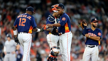 Jul 11, 2021; Houston, Texas, USA; Houston Astros starting pitcher Framber Valdez (59) gives the game ball to manager Dusty Baker (12) after being relieved from the game against the New York Yankees during the fifth inning at Minute Maid Park. Mandatory C