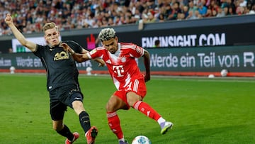 Augsburg's Greek defender #13 Dimitrios Giannoulis (L) and Bayern Munich's Colombian forward #14 Luis Diaz vie for the ball during the German first division Bundesliga football match between FC Augsburg and FC Bayern Munich in Augsburg, southern Germany, on August 30, 2025. (Photo by Michaela STACHE / AFP) / DFL REGULATIONS PROHIBIT ANY USE OF PHOTOGRAPHS AS IMAGE SEQUENCES AND/OR QUASI-VIDEO