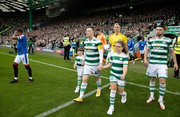 Callum McGregor and Joe Hart leads out the sides