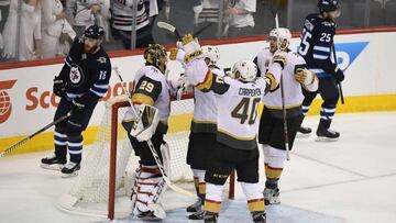 WINNIPEG, MB - MAY 20: The Vegas Golden Knights celebrate defeating the Winnipeg Jets 2-1 in Game Five of the Western Conference Finals to advance to the 2018 NHL Stanley Cup Final at Bell MTS Place on May 20, 2018 in Winnipeg, Canada.   David Lipnowski/Getty Images/AFP
 == FOR NEWSPAPERS, INTERNET, TELCOS &amp; TELEVISION USE ONLY ==