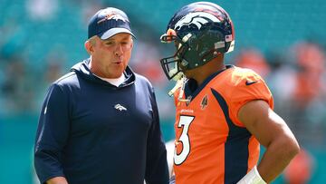 MIAMI GARDENS, FLORIDA - SEPTEMBER 24: Head coach Sean Payton of the Denver Broncos talks to Russell Wilson #3 of the Denver Broncos prior to a game against the Miami Dolphins at Hard Rock Stadium on September 24, 2023 in Miami Gardens, Florida. Megan Briggs/Getty Images/AFP (Photo by Megan Briggs / GETTY IMAGES NORTH AMERICA / Getty Images via AFP)