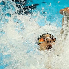 Phelps augments legend status; Simone Manuel makes history