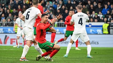 Portugal's Portugal's forward #07 Cristiano Ronaldo (C) reacts as he is tackled during the friendly football match between Ivory Coast and Uruguay, at the the Stadium Stozice in Ljubljana, on March 26, 2024. (Photo by Jure Makovec / AFP)