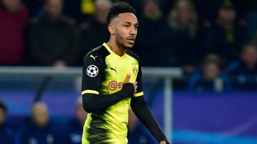 (FILES) This file photo taken on November 21, 2017 shows Dortmund&#039;s Gabonese forward Pierre-Emerick Aubameyang celebrating scoring the opening goal during the UEFA Champions League Group H football match BVB Borussia Dortmund v Tottenham Hotspur at t