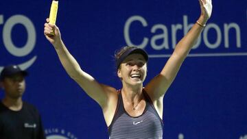 Elina Svitolina celebrates after beating Eugenie Bouchard.