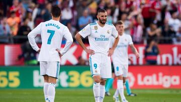GIRONA, SPAIN - OCTOBER 29: Karim Benzema and Cristiano Ronaldo of Real Madrid CF react after Cristian 'Portu' of Girona FC scored his team's second goal during the La Liga match between Girona and Real Madrid at Estadi de Montilivi on October 29, 2017 in Girona, Spain. (Photo by Alex Caparros/Getty Images)