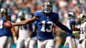 (FILES) In this file photo taken on October 7, 2018 Odell Beckham Jr. #13 of the New York Giants reacts against the Carolina Panthers in the second quarter during their game at Bank of America Stadium in Charlotte, North Carolina. - New York Giants owner John Mara hit out at star receiver Odell Beckham Jr. on October 16, 2018 as he reflected on his team's "embarrassing" start to the NFL season. Beckham, who signed a record five-year $95 million contract extension with the Giants in August, has cut a frustrated figure this season as the NFC East outfit has won just one out of six games. (Photo by GRANT HALVERSON / GETTY IMAGES NORTH AMERICA / AFP)