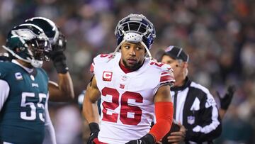 PHILADELPHIA, PA - JANUARY 21: Saquon Barkley #26 of the New York Giants looks on against the Philadelphia Eagles during the NFC Divisional Playoff game at Lincoln Financial Field on January 21, 2023 in Philadelphia, Pennsylvania. (Photo by Mitchell Leff/Getty Images)