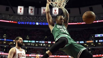 Apr 28, 2017; Chicago, IL, USA; Boston Celtics forward Gerald Green (30) dunks the ball as Chicago Bulls forward Nikola Mirotic (44) looks on during the first quarter in game six of the first round of the 2017 NBA Playoffs at United Center. Mandatory Credit: David Banks-USA TODAY Sports