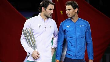SHANGHAI, CHINA - OCTOBER 15: Roger Federer of Switzerland with Rafael Nadal of Spain pose with their trophies after the Men's singles final mach on day eight of 2017 ATP Shanghai Rolex Masters at Qizhong Stadium on October 15, 2017 in Shanghai, China. (Photo by Lintao Zhang/Getty Images)