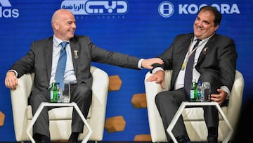 FIFA President Gianni Infantino (L) and Victor Montagliani.