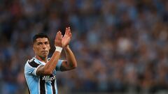 Gremio's Uruguayan forward Luis Suarez claps during the Brazilian Recopa Gaucha football match between Gremio and Sao Luiz at the Arena do Gremio stadium in Porto Alegre, Brazil on January 17, 2023. - Uruguayan international forward Luis Suarez has signed a two-year contract with Brazilian club Gremio. (Photo by SILVIO AVILA / AFP)