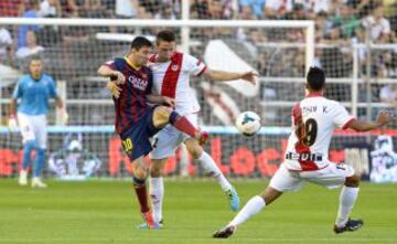 Leo Messi con Saúl.