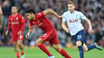 Liverpool's Colombian midfielder Luis Diaz runs with the ball during the English Premier League football match between Liverpool and Tottenham Hotspur at Anfield in Liverpool, north west England on May 7, 2022. (Photo by Paul ELLIS / AFP) / RESTRICTED TO EDITORIAL USE. No use with unauthorized audio, video, data, fixture lists, club/league logos or 'live' services. Online in-match use limited to 120 images. An additional 40 images may be used in extra time. No video emulation. Social media in-match use limited to 120 images. An additional 40 images may be used in extra time. No use in betting publications, games or single club/league/player publications. / 