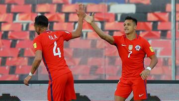 Football Soccer - Chile v Venezuela - World Cup 2018 Qualifiers - Monumental Stadium, Santiago, Chile - 28/3/17 - Chile's Alexis Sanchez (R) celebrate with teammate Mauricio Isla his goal against Venezuela. REUTERS/Ivan Alvarado
