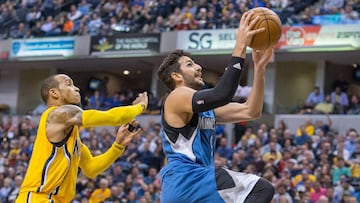 Mar 28, 2017; Indianapolis, IN, USA; Minnesota Timberwolves guard Ricky Rubio (9) shoots the ball while Indiana Pacers guard Monta Ellis (11) defends in the first half of the game at Bankers Life Fieldhouse. Mandatory Credit: Trevor Ruszkowski-USA TODAY Sports