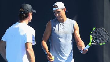 MELBOURNE, AUSTRALIA - JANUARY 10: Raphael Nadal of Spain talks to coach Carlos Moya during a practice session ahead of the 2017 Australian Open at Melbourne Park on January 10, 2017 in Melbourne, Australia. (Photo by Michael Dodge/Getty Images)