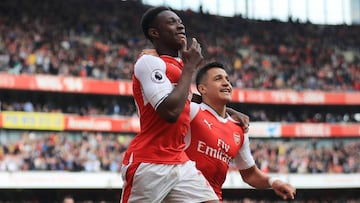 LONDON, ENGLAND - MAY 07:  Danny Welbeck of Arsenal celebrates scoring his sides second goal with Alexis Sanchez of Arsenal during the Premier League match between Arsenal and Manchester United at the Emirates Stadium on May 7, 2017 in London, England.  (